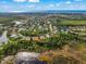 This beautiful aerial view shows the neighborhood of similar single Gathering homes at 790 Shadow Bay Way, Osprey, FL 34229