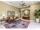 Comfortable living room with plush furnishings and a decorative rug at 790 Shadow Bay Way, Osprey, FL 34229