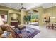 Open living space featuring a living room, dining area, and outdoor access, perfect for entertaining at 790 Shadow Bay Way, Osprey, FL 34229
