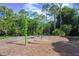 Community playground featuring swings and a soft landing surface at 790 Shadow Bay Way, Osprey, FL 34229