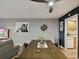 Inviting dining area with modern furnishings and decor, leading to the updated kitchen at 1655 58Th S Ter # 7, St Petersburg, FL 33712