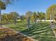 Outdoor exercise equipment on artificial grass at 1655 58Th S Ter # 7, St Petersburg, FL 33712