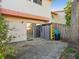 The patio has a sliding glass door, storage unit, and weathered concrete at 1655 58Th S Ter # 7, St Petersburg, FL 33712