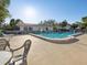 This community pool area is a great place to relax with plenty of lounge seating at 1655 58Th S Ter # 7, St Petersburg, FL 33712