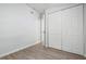 Bedroom features light colored walls and floor along with ample closet space at 1717 32Nd St, Sarasota, FL 34234