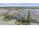 Aerial view of a home with a solar panel system at 328 Aria Dr, Nokomis, FL 34275