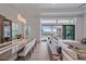 Dining and living area showcasing indoor-outdoor flow with a view of the pool and backyard at 328 Aria Dr, Nokomis, FL 34275