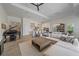 Open-concept living space with piano and gourmet kitchen at 328 Aria Dr, Nokomis, FL 34275