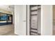 Open closet in bedroom features built in shelving and storage drawers at 111 S Pineapple Ave # 708, Sarasota, FL 34236