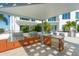 Modern outdoor kitchen equipped with stainless steel appliances at 111 S Pineapple Ave # 708, Sarasota, FL 34236