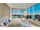 Serene main bedroom with water views, natural light, and stylish contemporary design at 223 Golden Gate Point # 2A, Sarasota, FL 34236