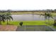 Scenic backyard view overlooking lake and golf course at 2611 Little Country Rd, Parrish, FL 34219