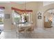 Cozy breakfast nook features large windows overlooking the lanai at 2611 Little Country Rd, Parrish, FL 34219