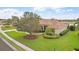 Lovely single-Gathering home with manicured landscaping and mature trees in a well-maintained community at 2611 Little Country Rd, Parrish, FL 34219