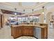 Kitchen with a center island, stainless steel appliances, and scenic views at 2611 Little Country Rd, Parrish, FL 34219