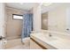 Bathroom with shower-tub, tile and contemporary fixtures at 5343 Huntingwood Ct # 33, Sarasota, FL 34235