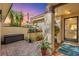 Charming outdoor patio space featuring pavers and lush landscaping under a stunning colorful twilight sky at 5343 Huntingwood Ct # 33, Sarasota, FL 34235
