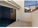 Enclosed brick patio featuring sliding glass doors and a large window allowing for ample natural light at 5343 Huntingwood Ct # 33, Sarasota, FL 34235