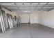 Spacious, unfinished garage with plenty of room for parking, storage, and potential workshop space at 6914 45Th E Ter, Bradenton, FL 34203