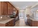 Bright kitchen with stainless steel appliances, tile backsplash, and open layout at 6914 45Th E Ter, Bradenton, FL 34203