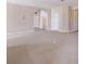Spacious open room featuring neutral paint and carpet, perfect for a flexible living space at 6914 45Th E Ter, Bradenton, FL 34203