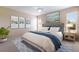 Comfortable main bedroom featuring a ceiling fan and relaxing decor at 6914 45Th E Ter, Bradenton, FL 34203