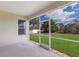 Screened patio overlooking a well-maintained lawn and a privacy fence at 6914 45Th E Ter, Bradenton, FL 34203
