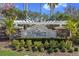 Welcoming entrance sign for The Reserve at Crossing Creek with lush landscaping at 6914 45Th E Ter, Bradenton, FL 34203