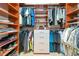 Custom closet with ample shelving and hanging space offers plenty of room for organization at 16806 5Th Ne Ter, Bradenton, FL 34212