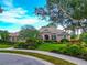Charming home with lush landscaping, a well-manicured lawn, and a welcoming front entrance at 16806 5Th Ne Ter, Bradenton, FL 34212