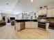 Modern open kitchen with stainless steel appliances, ample counter space and open floor plan at 16806 5Th Ne Ter, Bradenton, FL 34212