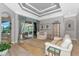 Bright living room with stylish decor, comfortable seating, and access to the outdoor patio at 16806 5Th Ne Ter, Bradenton, FL 34212