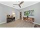 This bright living room is highlighted by a unique glass-top table with a wood base at 16806 5Th Ne Ter, Bradenton, FL 34212