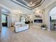 Living room showcasing the open floor plan, tile flooring, and arched doorways at 16806 5Th Ne Ter, Bradenton, FL 34212
