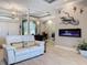 Inviting living area with stylish decor, tray ceilings, fireplace and neutral tones at 16806 5Th Ne Ter, Bradenton, FL 34212