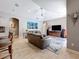 Open living room with vaulted ceilings, modern decor, tile flooring and comfortable seating arrangement at 16806 5Th Ne Ter, Bradenton, FL 34212