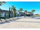 A clubhouse featuring outdoor seating and lush landscaping, perfect for community gatherings and relaxation at 204 Villoresi Blvd, Nokomis, FL 34275