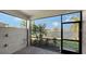The screened lanai features serene water views and black framed screens at 204 Villoresi Blvd, Nokomis, FL 34275