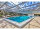 Community pool with a retractable cover for year-round swimming and recreation at 4045 Oakhurst Dr # 3125, Sarasota, FL 34233
