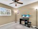 Bedroom with a window and desk, perfect for a home office or study area at 1382 Ronald St, North Port, FL 34286