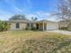 Cozy single-Gathering home featuring a screened porch and a well-kept lawn at 1382 Ronald St, North Port, FL 34286
