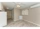 Cozy dining area with tile floors, leading to a doorway, and a window with curtains at 2299 Riverwood Ct, Sarasota, FL 34231