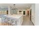 Well-equipped kitchen featuring a quartz island, stainless steel appliances, and ample cabinet space at 2299 Riverwood Ct, Sarasota, FL 34231