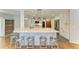 Modern kitchen with a large island, stainless steel appliances, and white cabinetry at 2299 Riverwood Ct, Sarasota, FL 34231