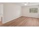 Bedroom featuring a ceiling fan and bright window with view of the yard at 2753 Orchid Oaks Dr # 104, Sarasota, FL 34239