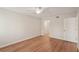 Clean, vacant bedroom space with bright window and light colored floors at 2753 Orchid Oaks Dr # 104, Sarasota, FL 34239
