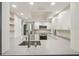 Well-equipped kitchen with stainless steel appliances and bright, recessed lighting at 2753 Orchid Oaks Dr # 104, Sarasota, FL 34239