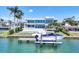 Contemporary waterfront property with a private boat dock and lift, a luxury pool and outdoor spaces at 3638 San Remo Ter, Sarasota, FL 34239