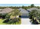 Charming home with a two-car garage, paver driveway, and well-maintained landscaping at 5023 Tobermory Way, Bradenton, FL 34211