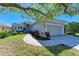 Charming home with a two-car garage, paver driveway, and well-maintained landscaping at 5023 Tobermory Way, Bradenton, FL 34211